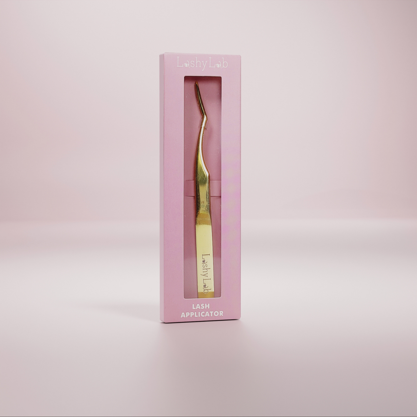A PRE-GLUED LASHES MIX-MATCH BUNDLE by Lashy Lab stands in a pink box against a soft pink background—ideal for easy, mess-free DIY eyelash extensions.
