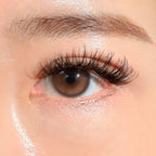 Close-up of an eye with long, thick eyelashes