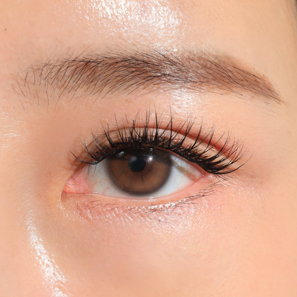 Close-up of a person's eye with Classic French eyelashextnersions