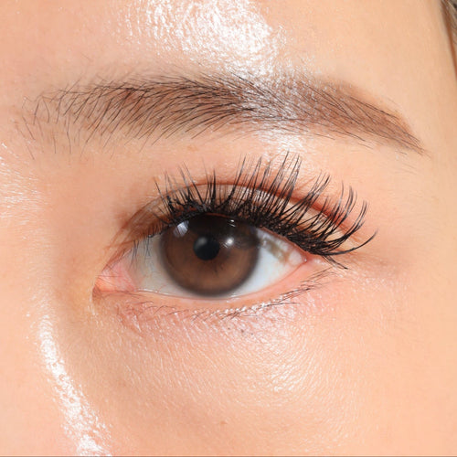 Close-up of long, cross eye lashes