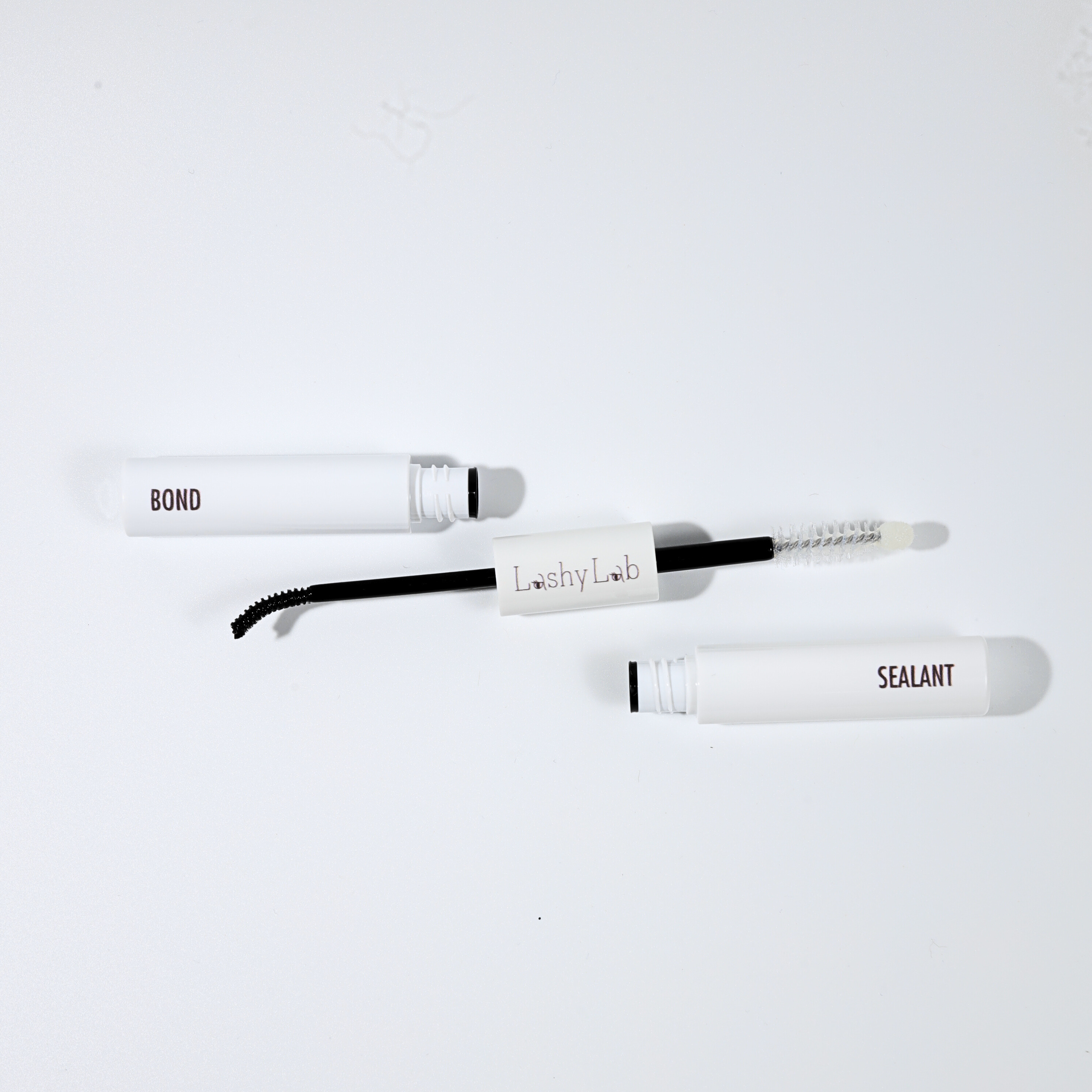 A white Bond and Sealant tube by LashyLab