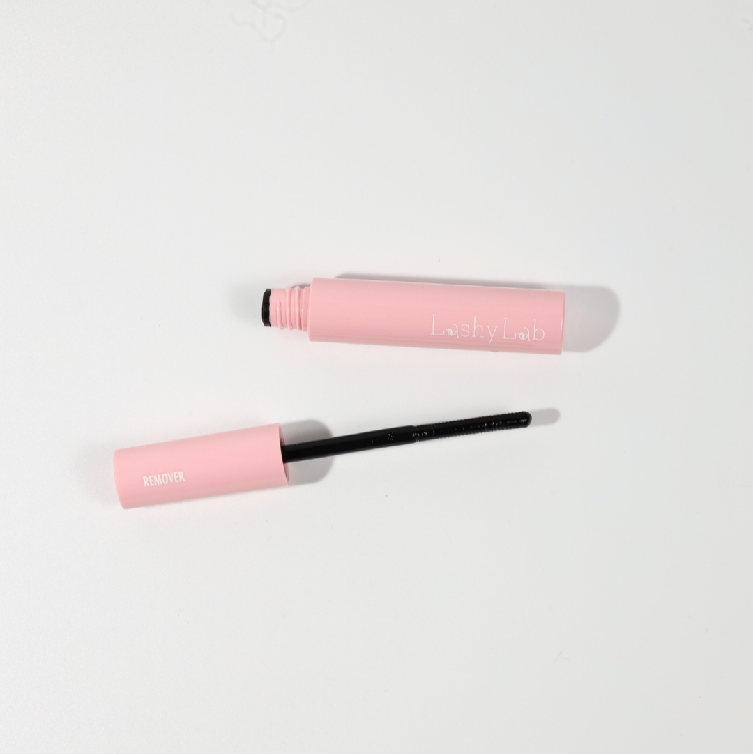 Pink tube Lash Off Remover on a white background