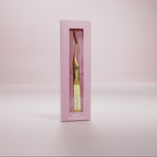Lash applicator by Lashy Lab stands in a pink box against a soft pink background—ideal for easy, mess-free DIY eyelash extensions.