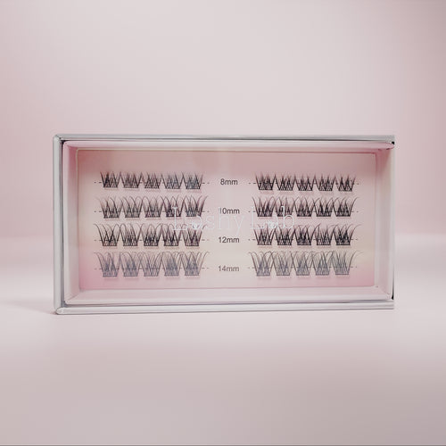 Lashy Lab’s CLASSIC FRENCH set features diy pro cluster lashes in four lengths—8mm, 10mm, 12mm, and 14mm—for effortless, natural beauty. The lashes are arranged in rows and displayed against a pink background.